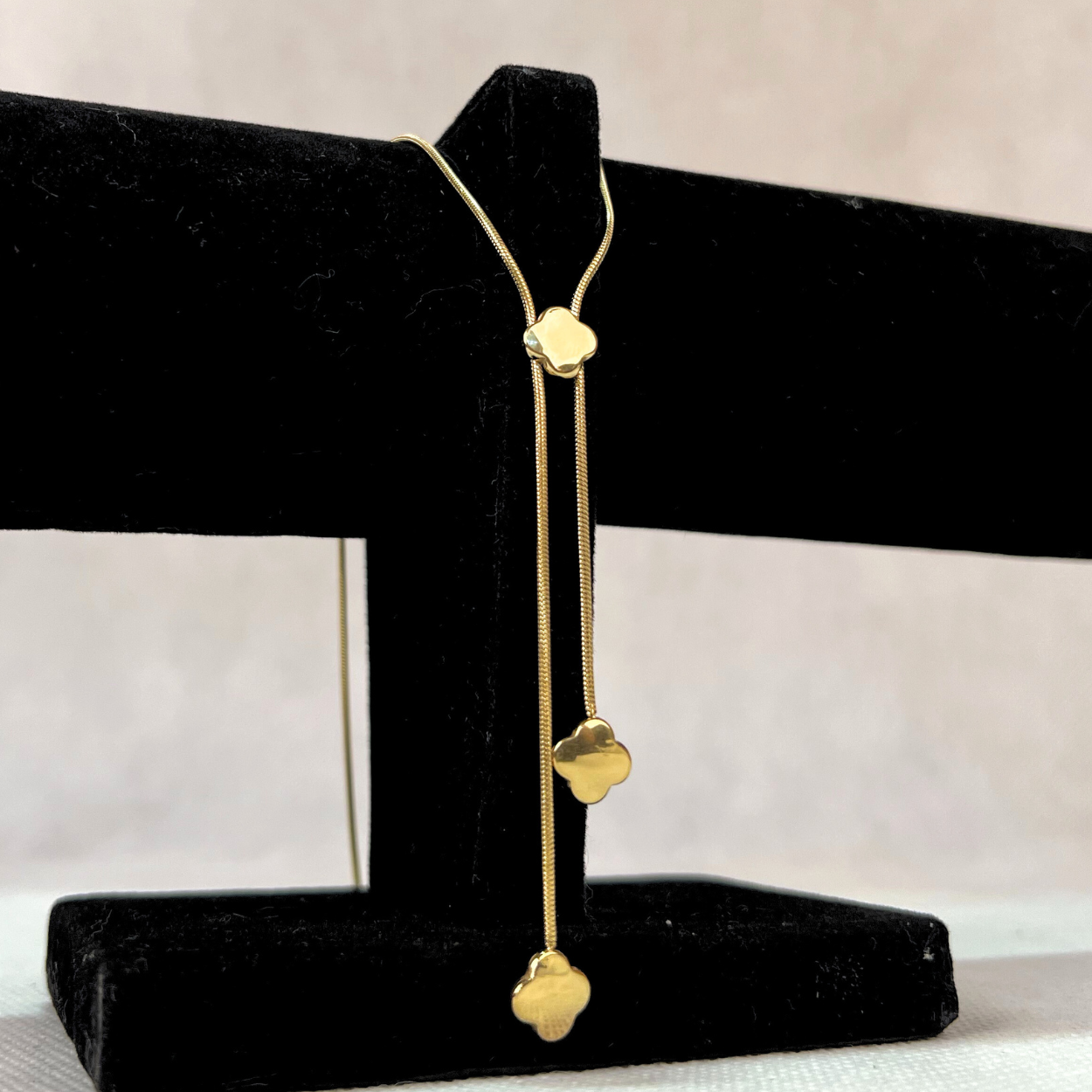 Elegant Gold Drop Necklace with Flower Motifs