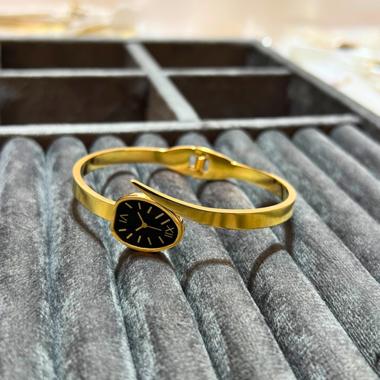 Classic Oval Dial Gold Bangle Watch