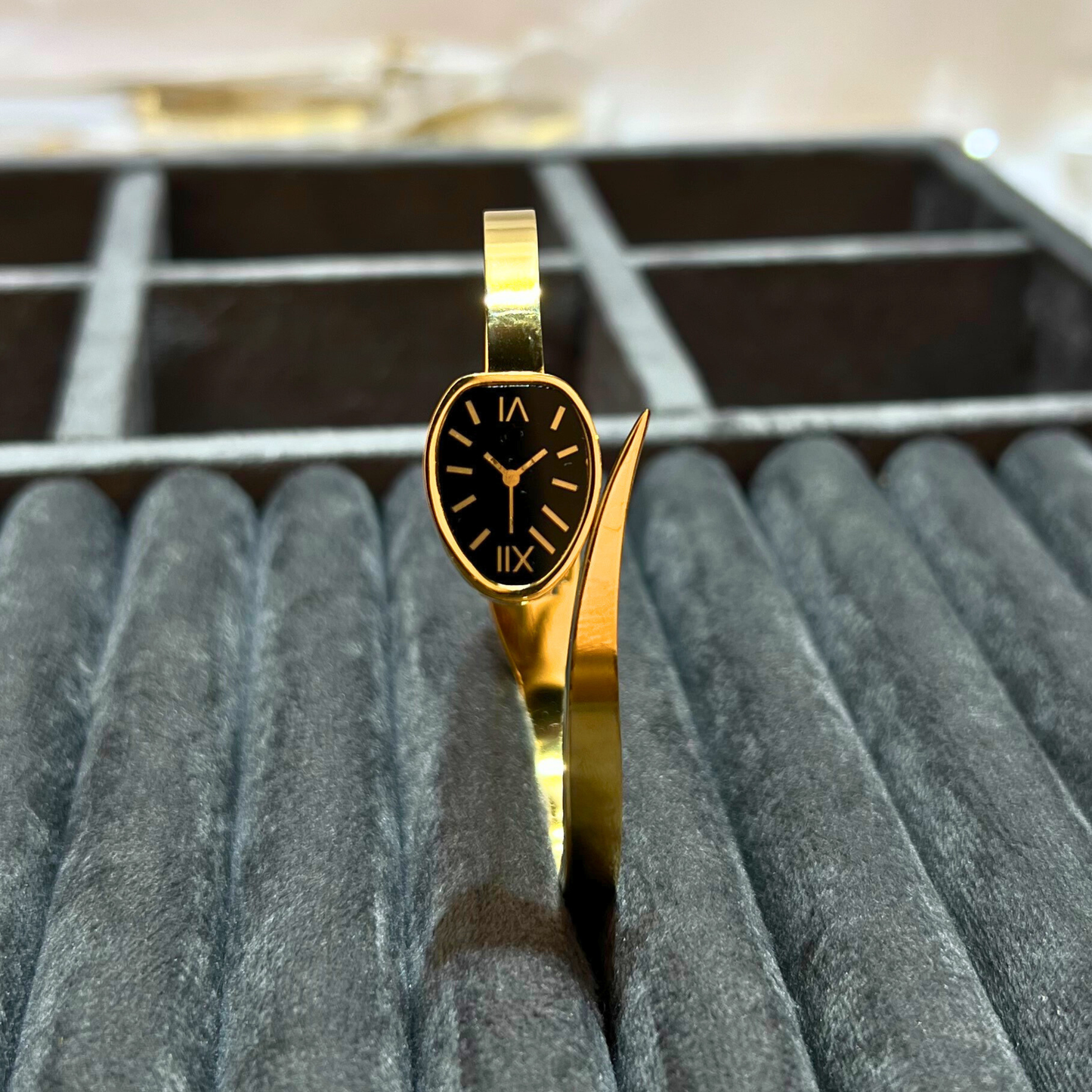 Classic Oval Dial Gold Bangle Watch