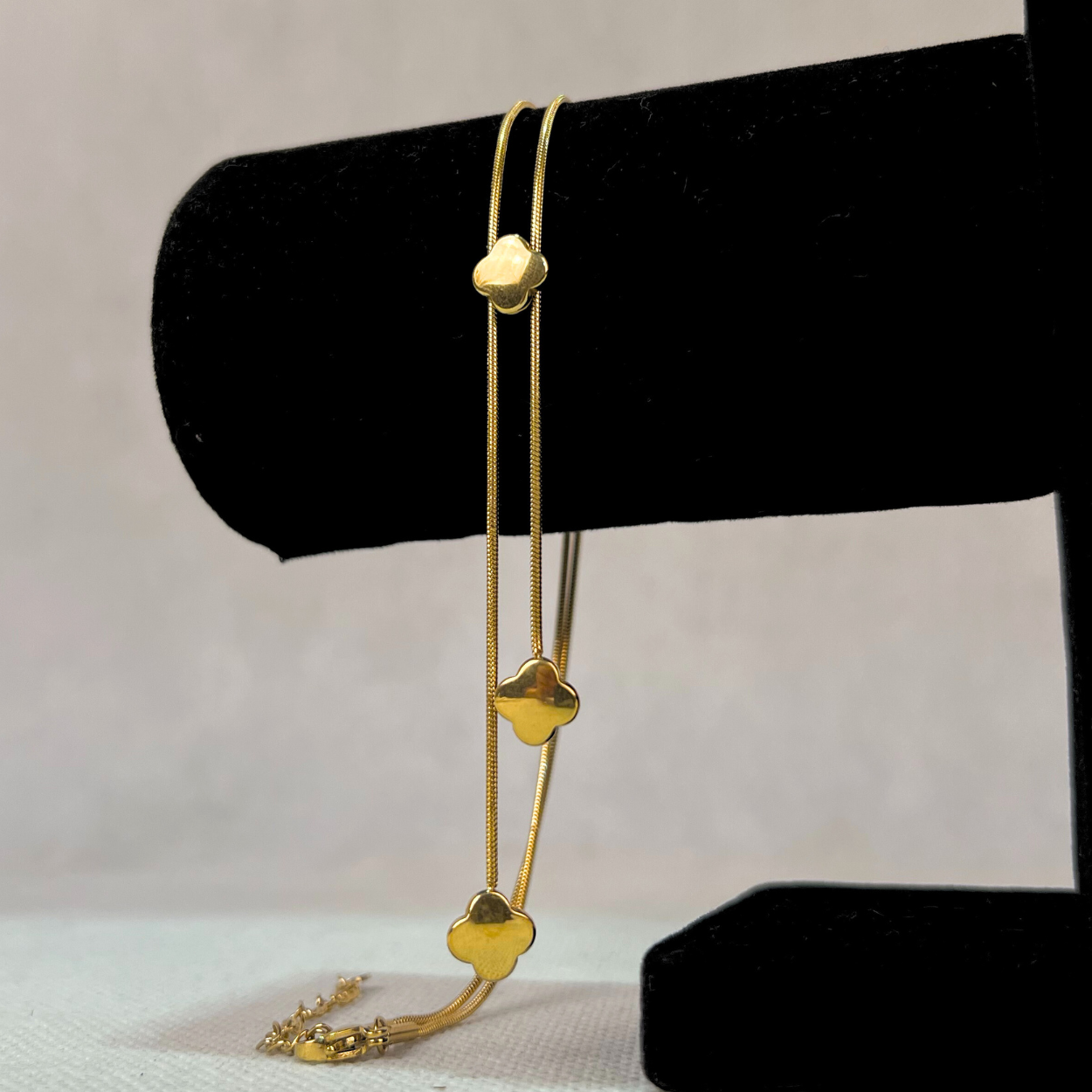 Elegant Gold Drop Necklace with Flower Motifs