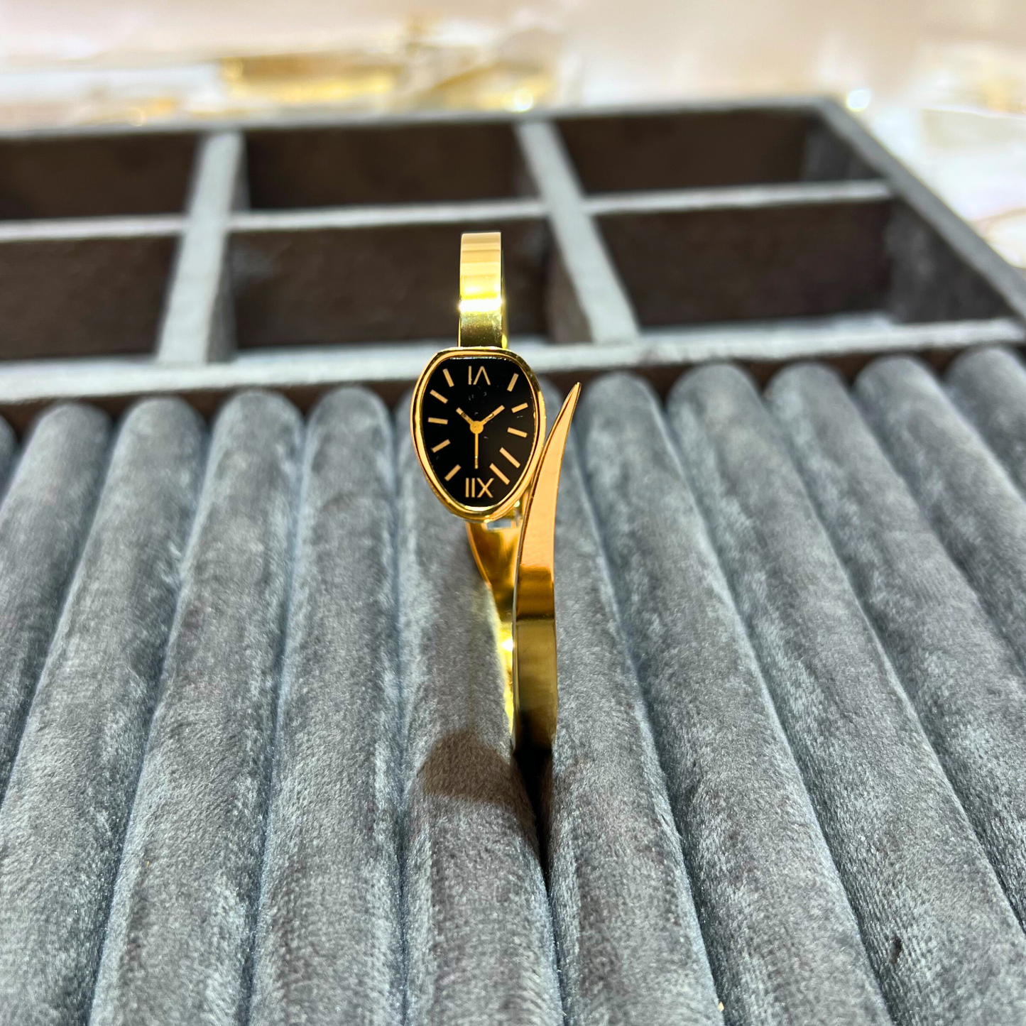 Classic Oval Dial Gold Bangle Watch